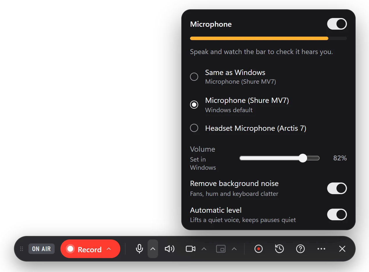 The microphone menu: a live level meter, the device list, volume, background noise removal and automatic level